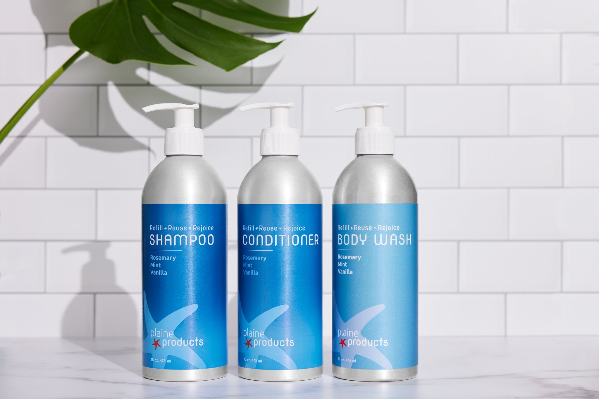 Plaine Products Body Wash in refillable aluminum bottle